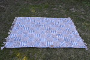 INDIGO DYED HANDWOVEN BLOCK PRINTED COTTON RUG WITH FLORAL DESIGN